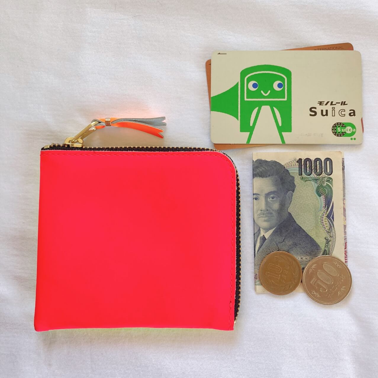 ネオンカラーのミニ財布はCOMME des GARCONS | LEE