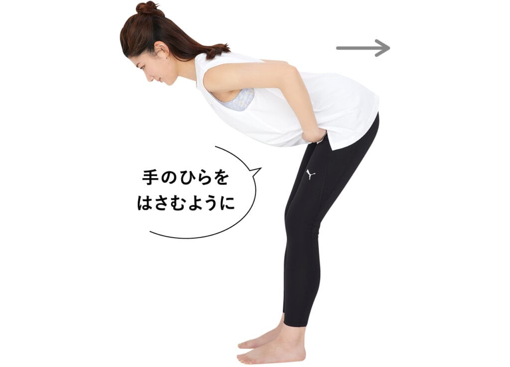 手のひらをはさむように