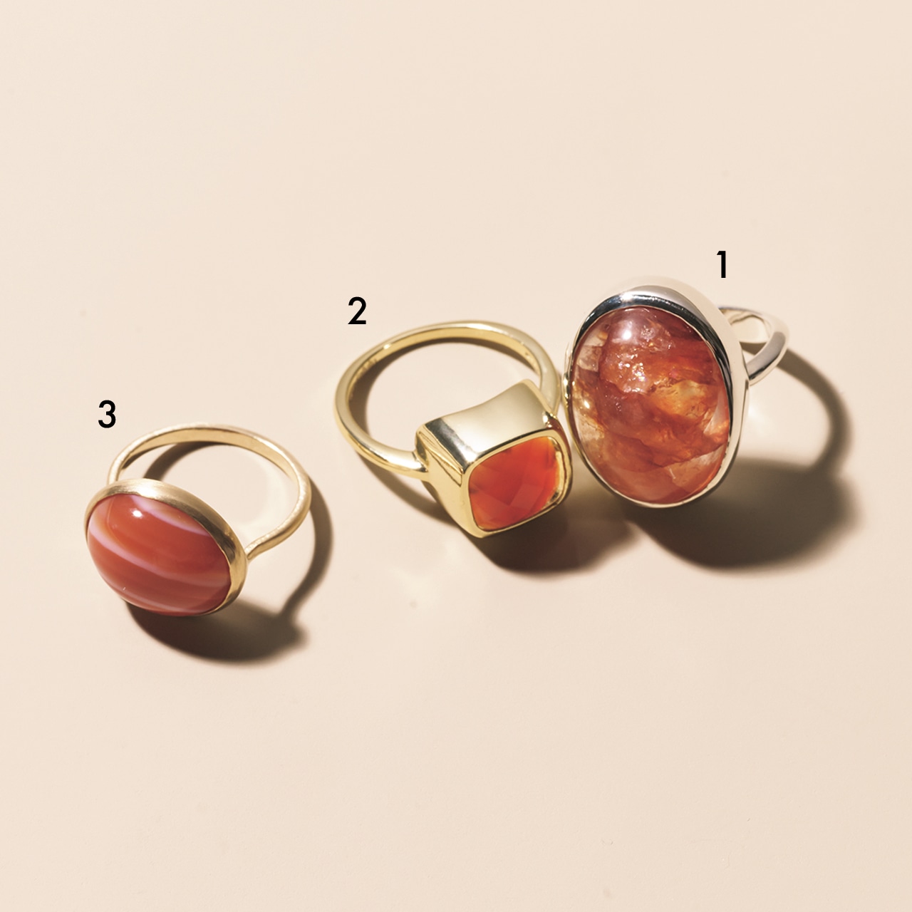 オレンジの色石リング３つ