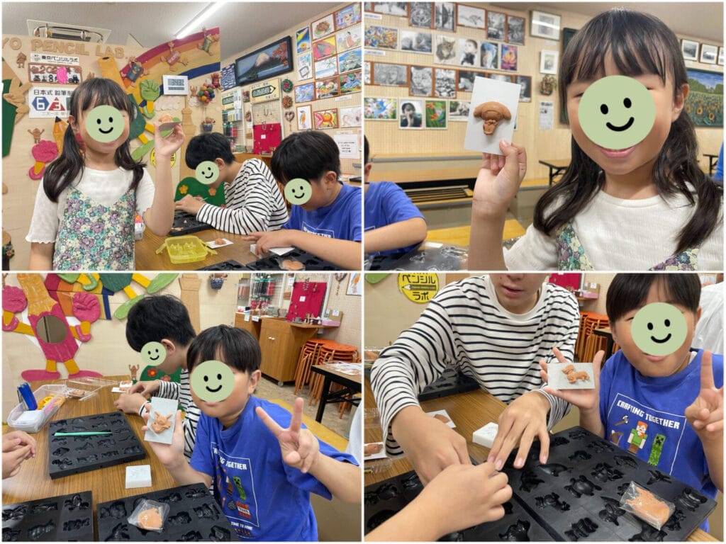 北星株式会社の工場見学施設内、「もくねんさん」ワークショップに参加する子ども達。