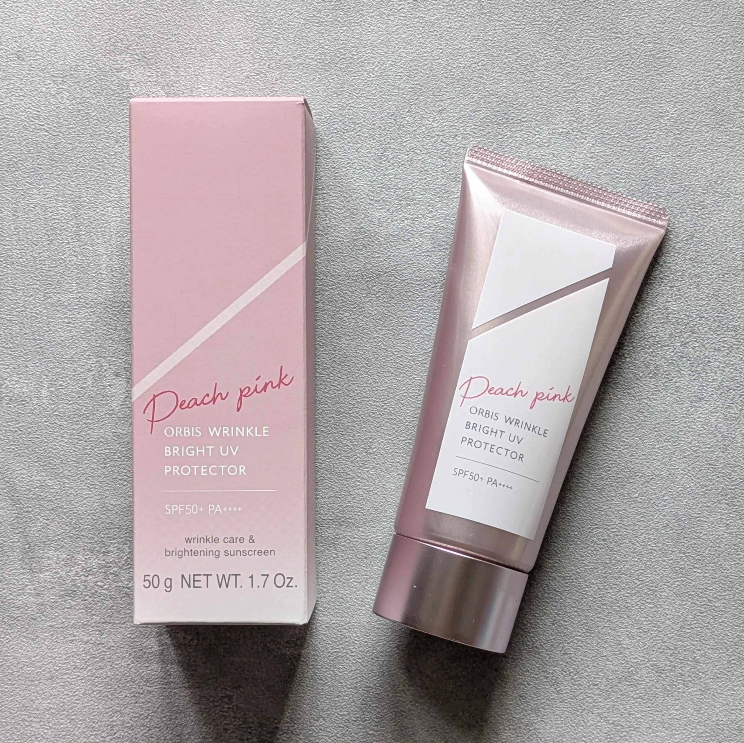 オルビス「リンクルブライトUVプロテクター ピーチピンク」箱と商品