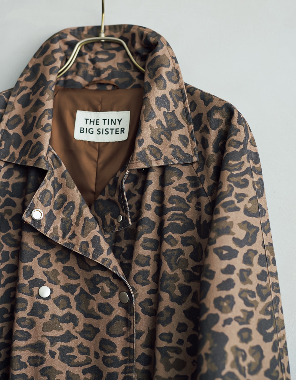 THE TINY BIG SISTER（ザタイニービッグシスター）のトレンチコート　￥57200