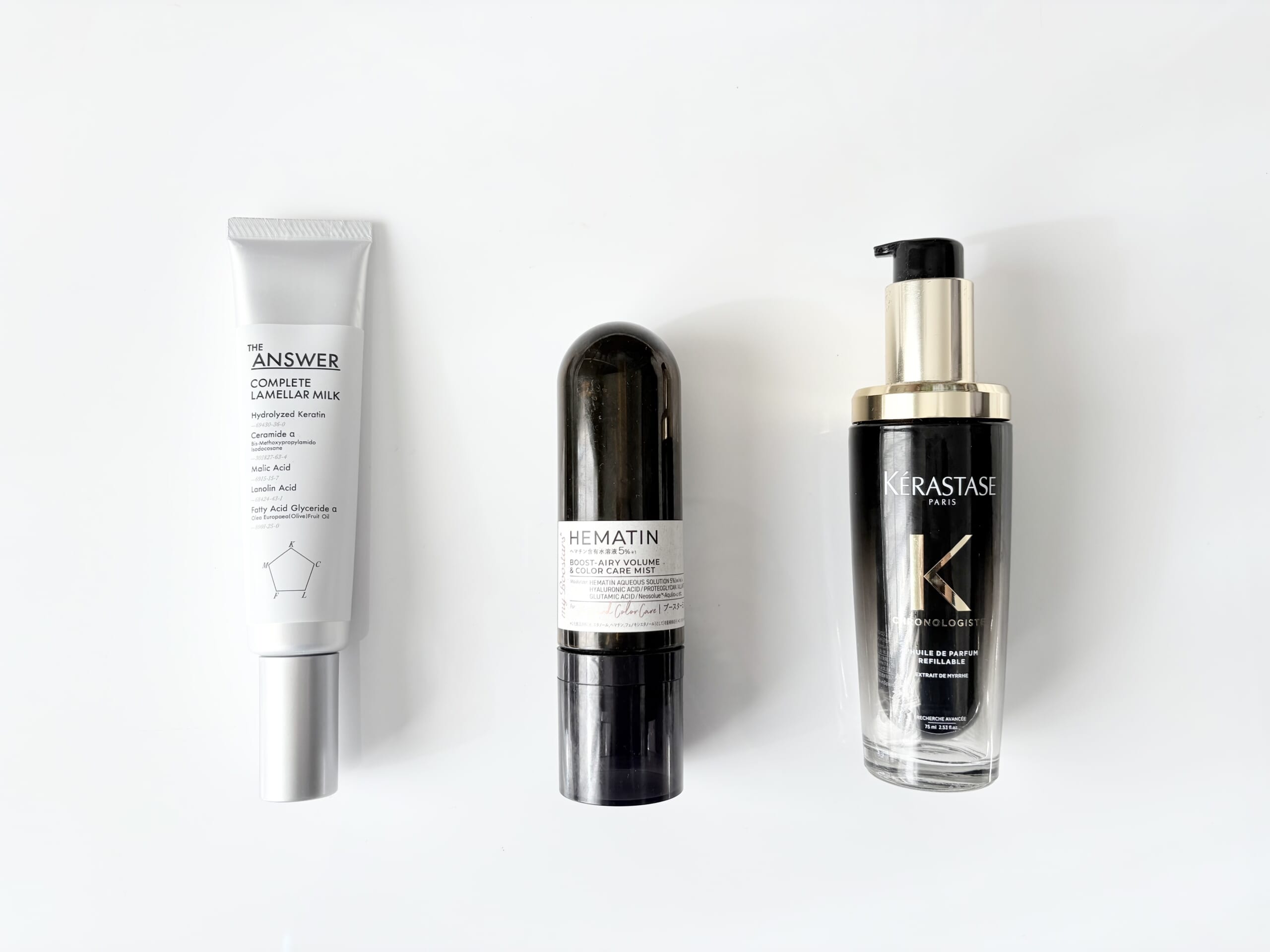 伊熊奈美さん使用トリートメント 左から、①髪を柔らかくしながら、素直で扱いやすい髪にしてくれるミルク。ジアンサー コンプリートラメラミルク 70g(オープン価格)/花王 ②インバストリートメント直前にもアウトバスとしても使えるヘマチン配合のミスト。細髪さんのハリコシアップにもヘアカラーのもちにも有効。マイブースターズ ヘマチンブースターミスト 90ml ¥1980/ネイチャーラボ ③UVや高温からのヒートプロテクト効果はもちろん、仕上がりのつややかさ、まとまり、軽やかさなどすべてがハイレベル。ユイルクロノロジスト N 75ml ¥6270/ケラスターゼ