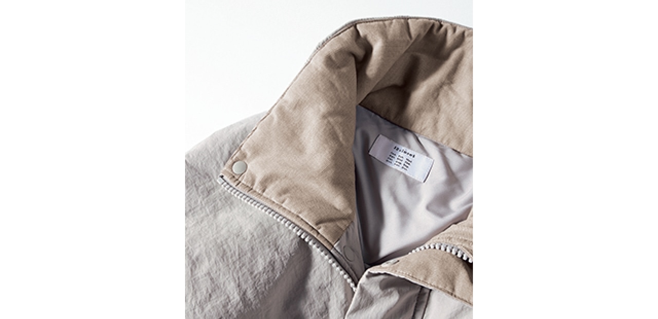 衿＆前立てに配した身頃と同系色のコーデュロイで洒落感とあたたかみを加味。