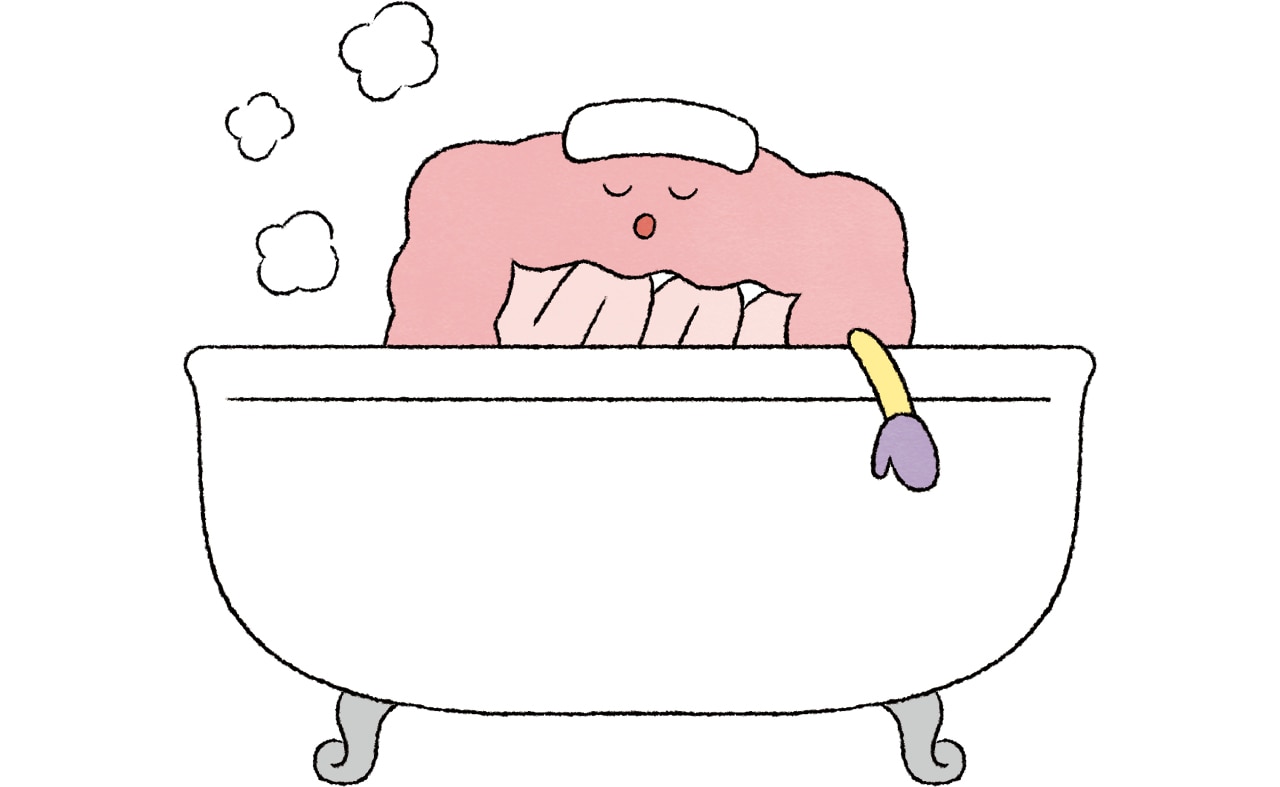 お風呂で温まる腸のイラスト