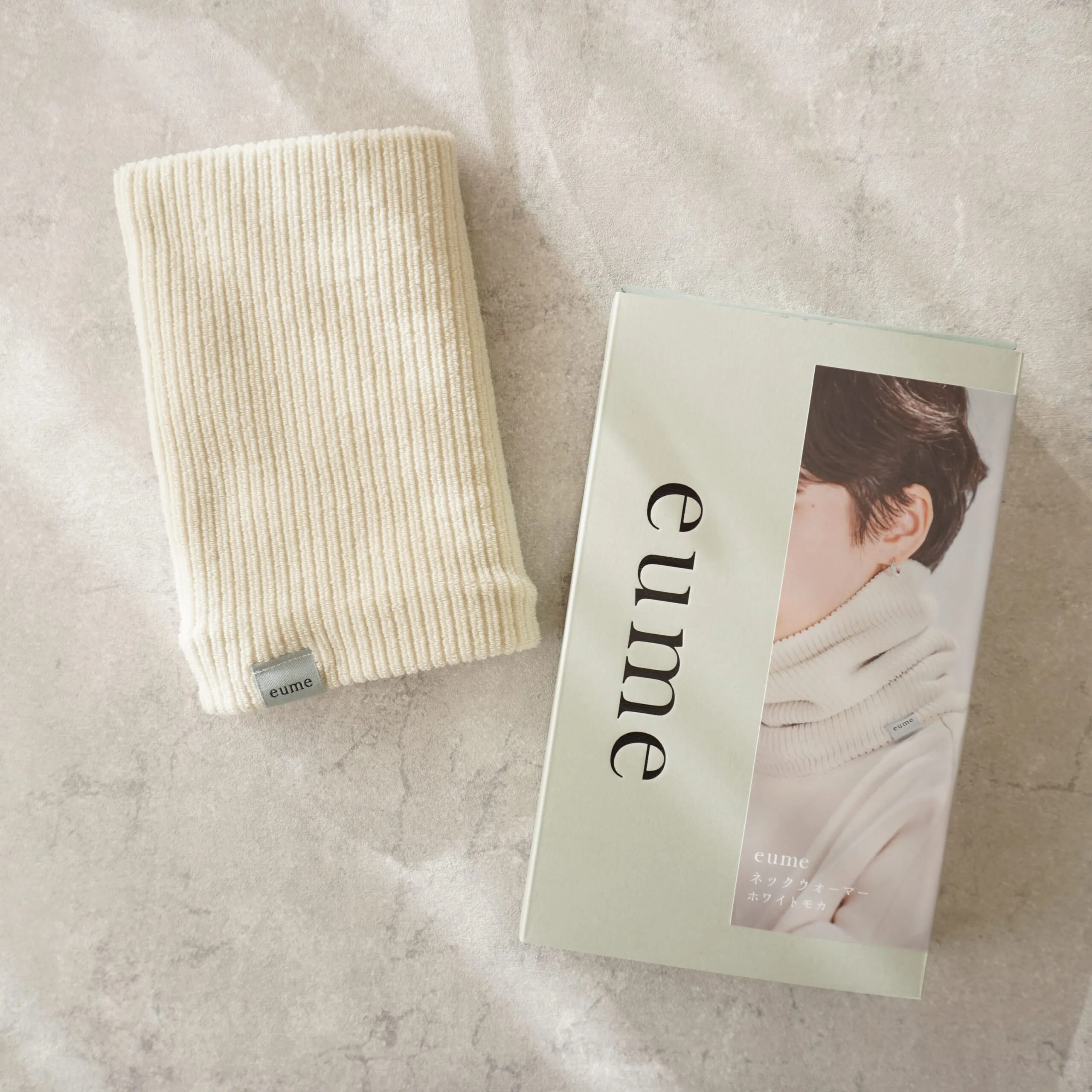 eume（イウミー）「ネックウォーマー」箱と商品