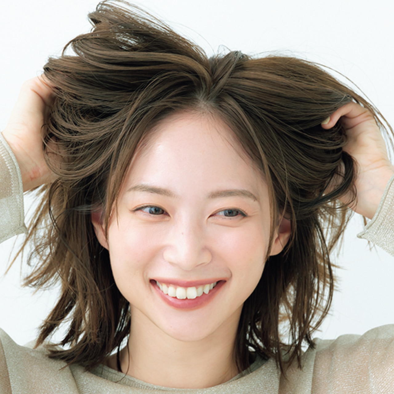 空気を入れ込むよう下からもみ込む