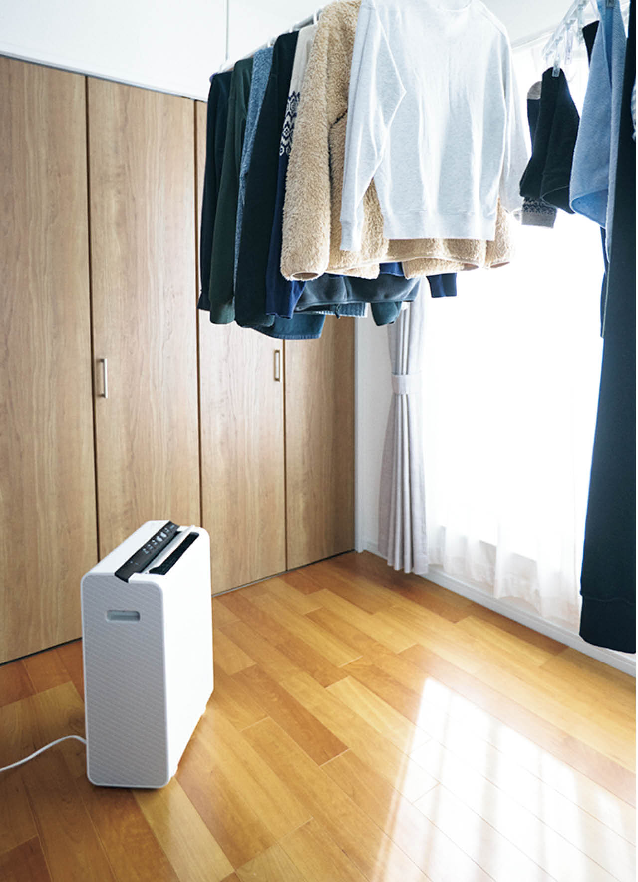 長い外干し動線は、除湿機で室内干しに！