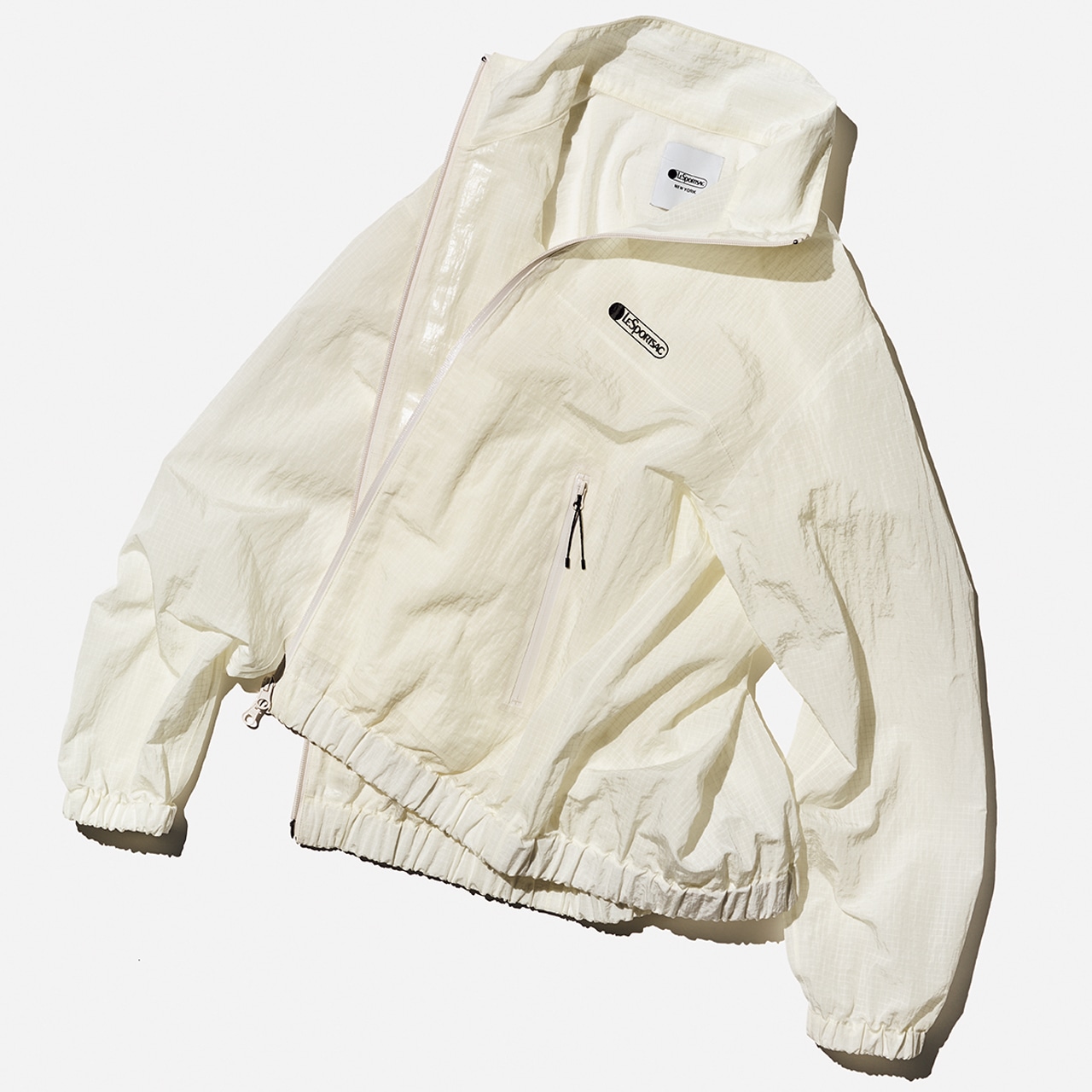 【LeSportsac（レスポートサック）】［アイボリーの透け感ブルゾン］￥29700