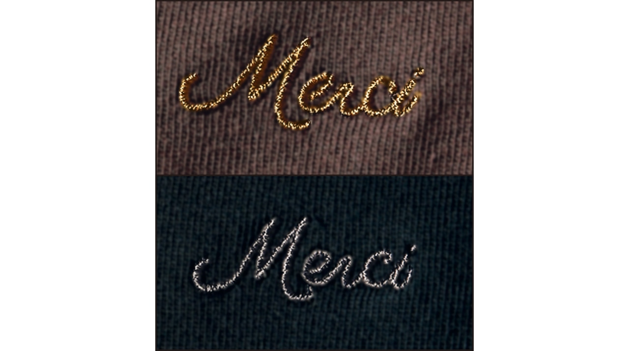 『Merci』のロゴ刺しゅうを、首もと後ろの衿ぐりにオン。生地と同色の糸を使い、あえてさりげなく仕上げました。