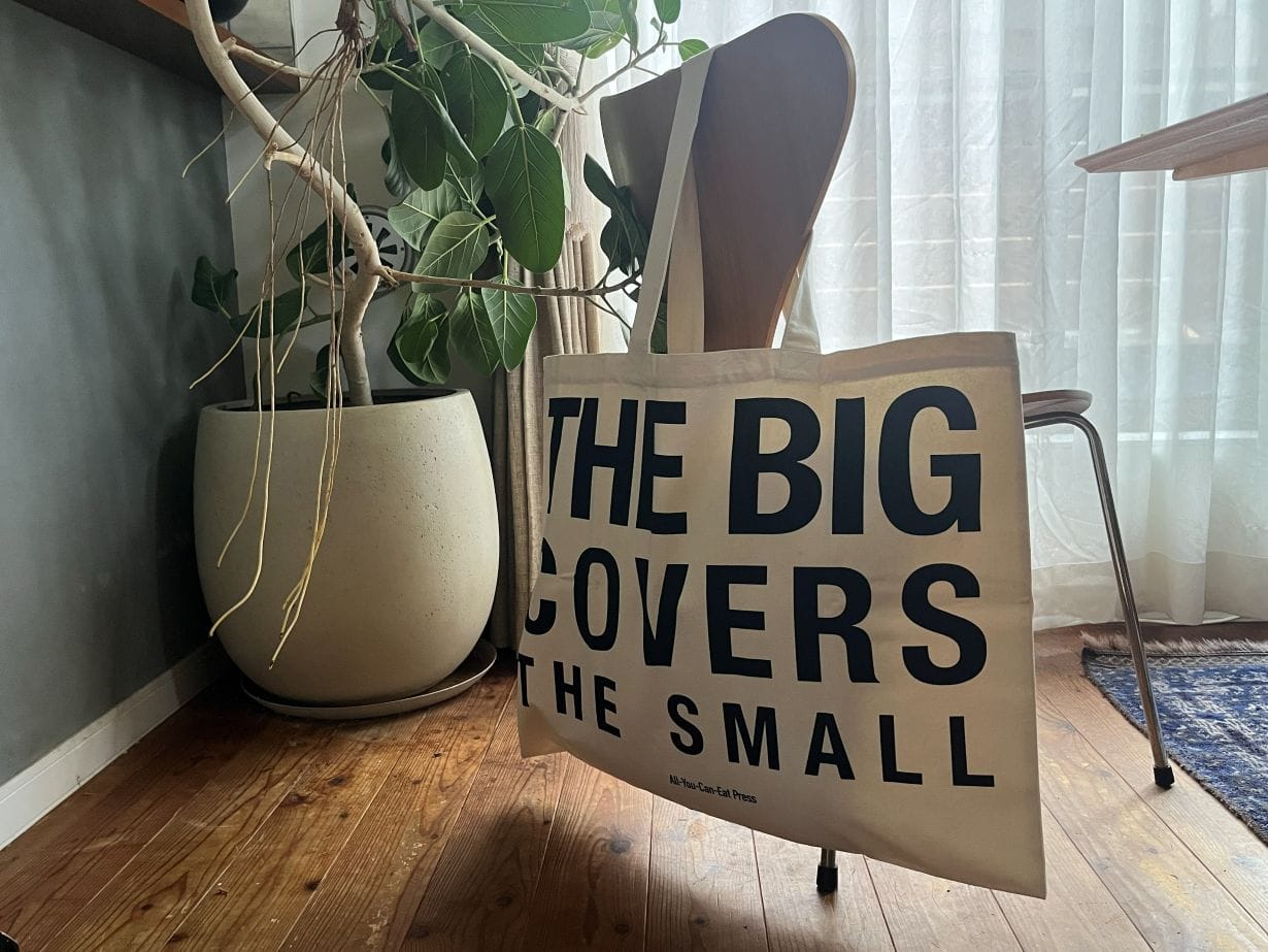 THE BIG COVERS THE SMALL